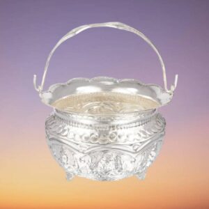 Ornate silver pot with handle
